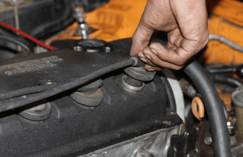 Removing spark plug to check spark plugs and spark plug wires